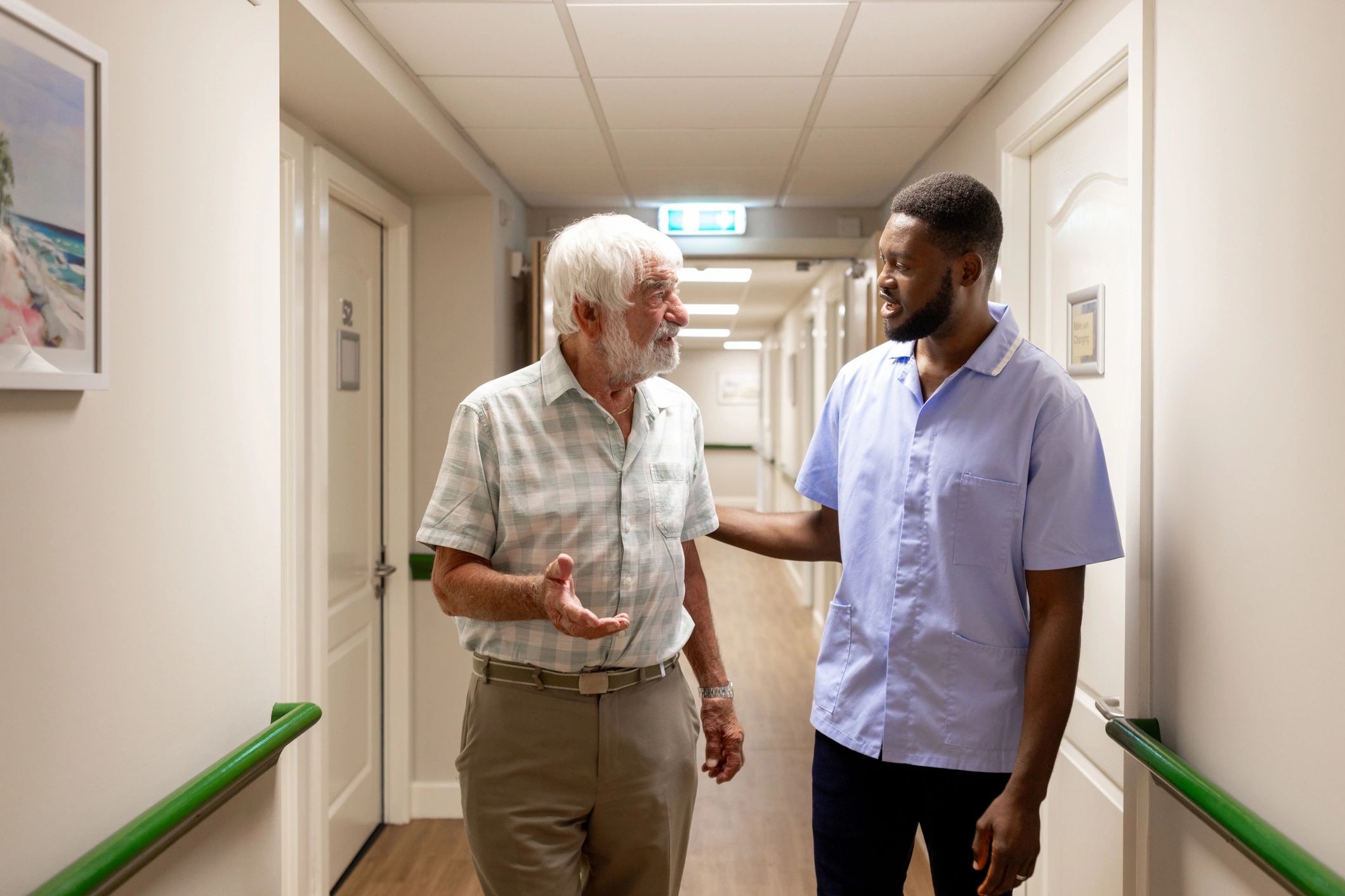 Healthcare worker catching up with residents