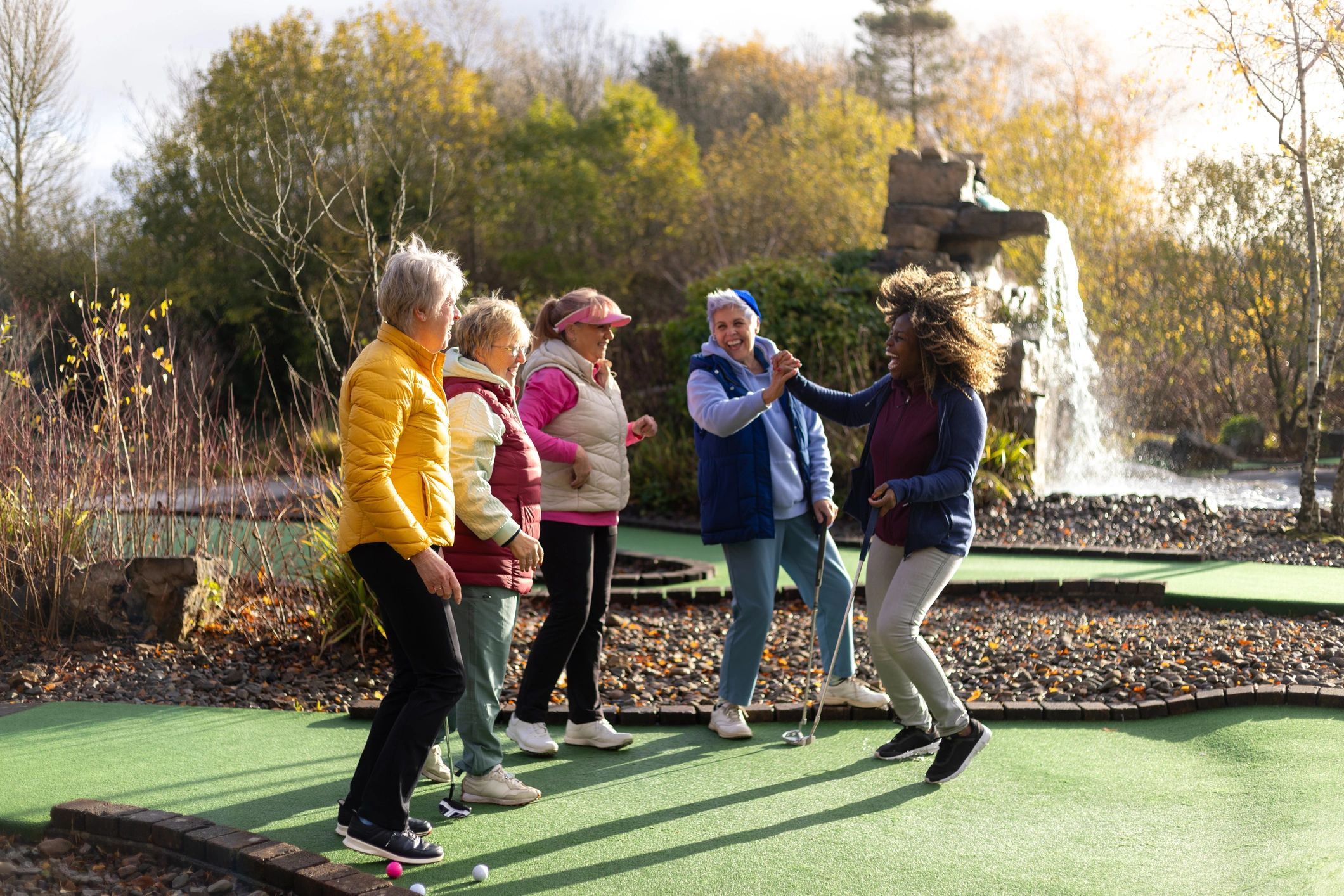 Adults participating in a supportive group outing